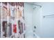 Clean, bright bathroom featuring a shower/tub combo with stylish printed shower curtain at 222 Torslanda Ln, Summerville, SC 29486