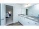 Granite countertops and double sinks in this bathroom connecting to the main bedroom at 222 Torslanda Ln, Summerville, SC 29486