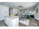Open-concept kitchen, dining, and living area with modern finishes, neutral color palettes, and plenty of natural light at 222 Torslanda Ln, Summerville, SC 29486