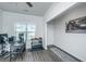 Bright office space with a computer desk, weights, and natural light at 222 Torslanda Ln, Summerville, SC 29486
