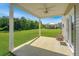 Enjoy the outdoors on this home's covered patio overlooking a large green space at 222 Torslanda Ln, Summerville, SC 29486