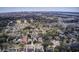 A charming neighborhood with beautiful trees and a city skyline in the distance creates a picturesque view at 229 Gordon St, Charleston, SC 29403