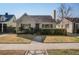 Charming single Gathering home with manicured front lawn and mature landscaping in a desirable neighborhood at 229 Gordon St, Charleston, SC 29403