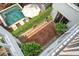 Backyard oasis with pool, patio, and lush landscaping, perfect for outdoor entertaining at 23 Felix St, Charleston, SC 29403