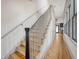 Hallway and stairway with wood flooring at 23 Felix St, Charleston, SC 29403