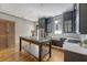 Kitchen with stainless steel appliances, custom cabinetry, and ample counter space at 23 Felix St, Charleston, SC 29403