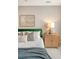 A close-up of the main bedroom highlighting the stylish decor and comfortable bedding at 23 Felix St, Charleston, SC 29403