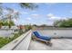 Charming rooftop patio featuring a chaise lounge with neighborhood views at 23 Felix St, Charleston, SC 29403