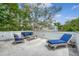Inviting rooftop patio with comfortable seating, including a blue cushioned chaise lounge at 23 Felix St, Charleston, SC 29403