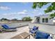 Comfortable rooftop patio with lounge chairs and outdoor seating, perfect for enjoying the weather at 23 Felix St, Charleston, SC 29403