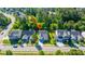 Aerial view of a residential home in a wooded neighborhood, showcasing the property's location and proximity to surrounding homes at 2314 Hummingbird Ln, Summerville, SC 29483
