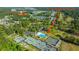 Aerial view of the community showcases home, pool, tennis courts and the Pine Forest Country Club in Myrtle Beach, SC at 2314 Hummingbird Ln, Summerville, SC 29483