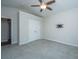 Nicely carpeted bedroom boasts a ceiling fan, double door closet and bracket for mounting a television at 2314 Hummingbird Ln, Summerville, SC 29483