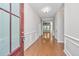 Elegant foyer with hardwood flooring, paneled walls, and clear sightlines to the living area at 2314 Hummingbird Ln, Summerville, SC 29483