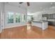 Open-concept living area featuring hardwood floors and ample natural light at 2314 Hummingbird Ln, Summerville, SC 29483