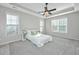Bright main bedroom with neutral colors, tray ceiling, and ample natural light at 2314 Hummingbird Ln, Summerville, SC 29483