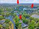 Aerial view of 2525 Bent Tree Ln nestled in a lush, green community with water views at 2525 Bent Tree Ln, Mount Pleasant, SC 29464