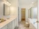 Bathroom with tiled floor leading to bathtub and glass shower at 2525 Bent Tree Ln, Mount Pleasant, SC 29464