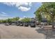Commercial building with brick facade, large windows, ample parking, and mature trees creating shade at 2525 Bent Tree Ln, Mount Pleasant, SC 29464