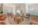Spacious living room with hardwood floors, an open floor plan, and a view into the dining area at 2525 Bent Tree Ln, Mount Pleasant, SC 29464