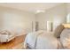 Serene main bedroom with a ceiling fan, hardwood floors, and a large window at 2525 Bent Tree Ln, Mount Pleasant, SC 29464