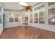 Inviting screened-in porch with skylights and views of the backyard at 2525 Bent Tree Ln, Mount Pleasant, SC 29464