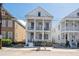 Charming two-story home with white brick facade and inviting front porch at 272 Coming St # C, Charleston, SC 29403