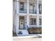 Inviting front entrance featuring a decorative wreath and freshly painted stairs at 272 Coming St # C, Charleston, SC 29403