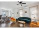 Open-concept living and dining area with modern furnishings and stylish decor at 272 Coming St # C, Charleston, SC 29403