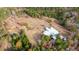 Expansive aerial view of the property with lush trees surrounding the building at 280 Royalegates Ct, Cross, SC 29436