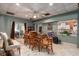 Dining room with a large table, chairs, and sliding glass doors at 280 Royalegates Ct, Cross, SC 29436