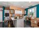 Kitchen with island featuring white cabinets and contrasting walls at 280 Royalegates Ct, Cross, SC 29436