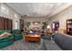 Spacious living room featuring a fireplace, multiple seating areas and access to other areas in the home at 280 Royalegates Ct, Cross, SC 29436