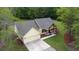 Aerial view of the home showcasing the roofline, garage, and landscaping at 2836 Edenborough Rd, Johns Island, SC 29455