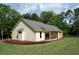 Exterior of a house showcasing a patio and a well-maintained lawn at 2836 Edenborough Rd, Johns Island, SC 29455