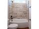 Bathroom featuring a tub with a tiled surround and black fixtures at 2836 Edenborough Rd, Johns Island, SC 29455