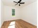 A basic bedroom with wood-look floors and single window at 2836 Edenborough Rd, Johns Island, SC 29455