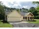 Beautiful exterior elevation of the home with a two-car garage and charming front porch at 2836 Edenborough Rd, Johns Island, SC 29455