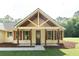 Inviting front porch with wood columns, shutters, and a stylish front door at 2836 Edenborough Rd, Johns Island, SC 29455