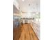 Bright kitchen with white cabinets, stainless steel appliances, and a large island at 2836 Edenborough Rd, Johns Island, SC 29455