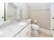 Bathroom featuring a granite countertop vanity, a toilet and a shower/bath with bright, neutral colors at 287 Commonwealth Rd, Mount Pleasant, SC 29466