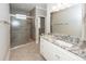 Bathroom showcasing a granite countertop, tiled shower and floors at 287 Commonwealth Rd, Mount Pleasant, SC 29466