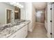 Bathroom featuring granite countertops, tiled floor, and a walk-in shower at 287 Commonwealth Rd, Mount Pleasant, SC 29466