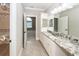 Bathroom with a white vanity, tiled floors, and views into the closet and bedroom at 287 Commonwealth Rd, Mount Pleasant, SC 29466