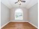 Spacious bedroom with hardwood floors and arched window at 287 Commonwealth Rd, Mount Pleasant, SC 29466