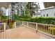 View of the deck and the manicured backyard that surrounds the property at 287 Commonwealth Rd, Mount Pleasant, SC 29466