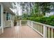 View of the wood deck and the backyard that surrounds the property at 287 Commonwealth Rd, Mount Pleasant, SC 29466