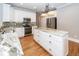 Modern kitchen with stainless steel appliances, granite countertops, and a center island at 287 Commonwealth Rd, Mount Pleasant, SC 29466