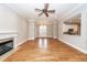 Large living area featuring hardwood floors, a fireplace, and an open layout at 287 Commonwealth Rd, Mount Pleasant, SC 29466