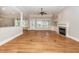 Spacious living room with a fireplace, built-in shelving, and plenty of natural light at 287 Commonwealth Rd, Mount Pleasant, SC 29466